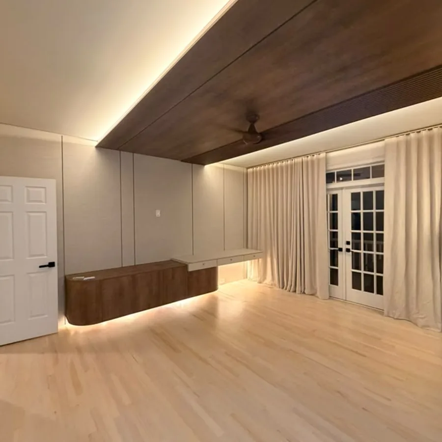 Bedroom with a floating wood console, LED lighting and a wood-paneled ceiling
